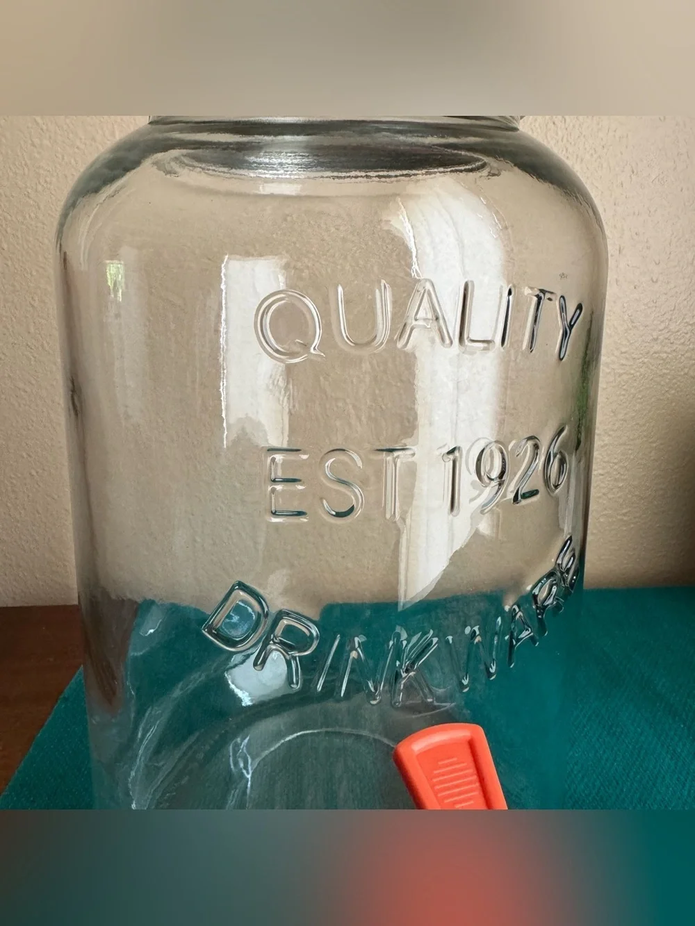 Quality Drinkware large beverage dispenser with salmon pink/peach lid